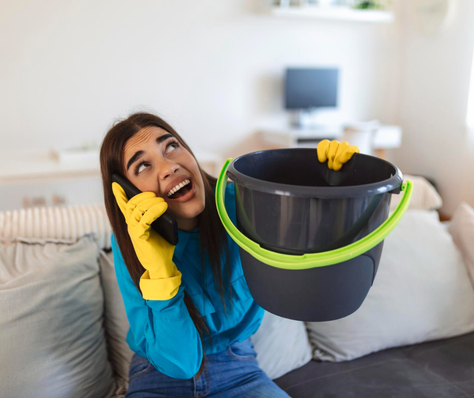 Tenant catches water from ceiling leak in a bucket